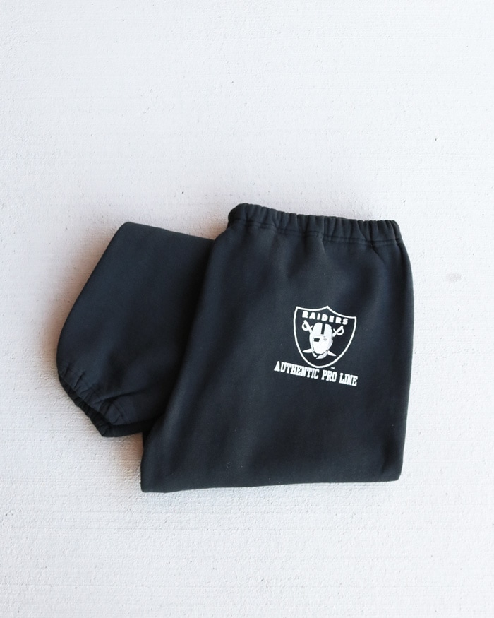 Vintage 90s Black RUSSELL ATHLETIC Sweat Pants "RAIDERS" (L)