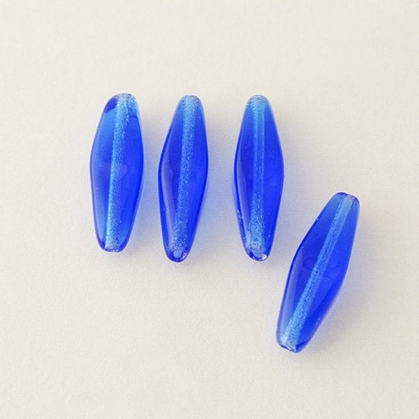 チェコビーズ ロングバイコーン 20×8mm サファイア 4個【プレストビーズ変形/バイコーン/20×8mm/アクセサリーパーツ/ハンドメイドパーツ】|プレストビーズ変形|チェコビーズ