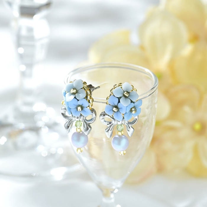 109＊ビオラ×紫陽花 ピアス/イヤリング ビオラ」（赤紫）の ピアス