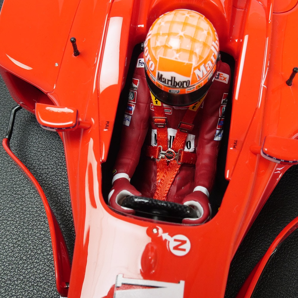 TOPMARQUES 1/12 フェラーリ F2000 2000 イタリアGPウィナー #3 M.シューマッハ ドライバーフィギア付 レッド GRP12-27AWD【デカール加工】