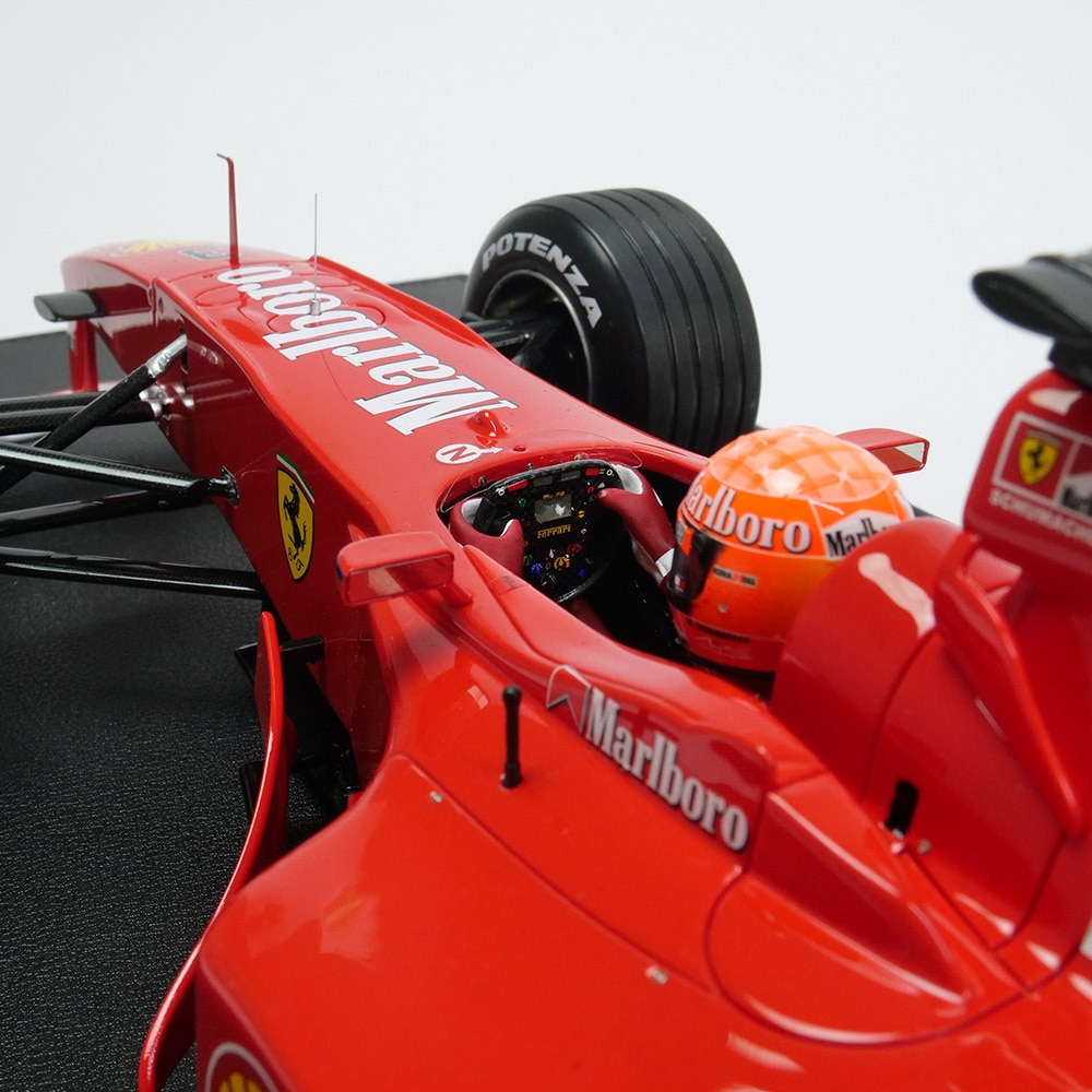 TOPMARQUES 1/12 フェラーリ F2000 2000 イタリアGPウィナー #3 M.シューマッハ ドライバーフィギア付 レッド GRP12-27AWD【デカール加工】