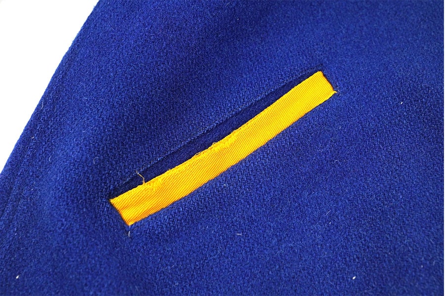 50's～ ''SOUTH TEXAS JUNIOR COLLEGE'' 背面チェーンステッチ メルトンボタスタ ブルー 実寸(38位)