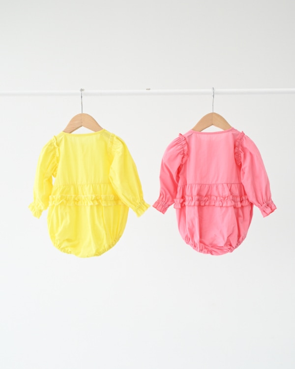 【エヌエイチティー】フリルロンパース / ピンク