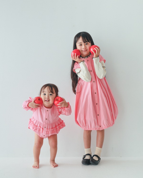 【エヌエイチティー】フリルロンパース / ピンク