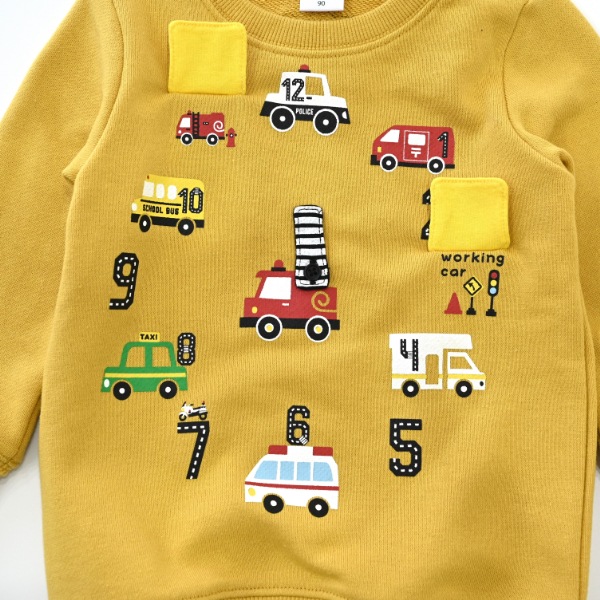 【25FW】働く車の時計 トレーナー / マスタード