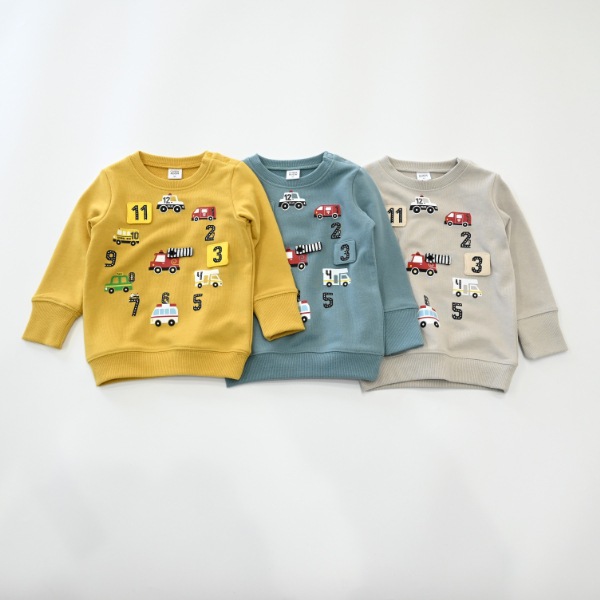 【25FW】働く車の時計 トレーナー / マスタード