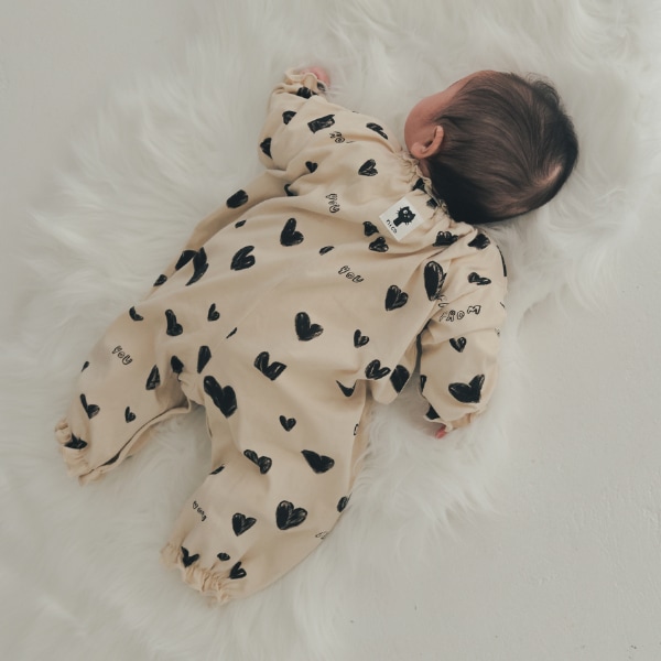 【25FW】アラカルト フリルロンパース / アイボリー