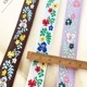 約1.8cm幅 細幅手芸用テープフラワーリボン ラメチロリアンテープ 花柄刺繍リボンブレード チロルテープ 営業日即日発送 [ワールデザインbistarai]