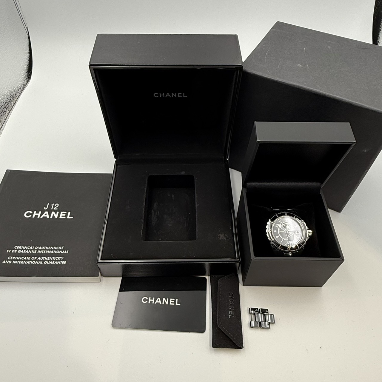 CHANEL(����ͥ�) J12 �ޥɥ⥢����38m ����555�� H5242 �֥�å� ����� ���ض�Ź ST-224