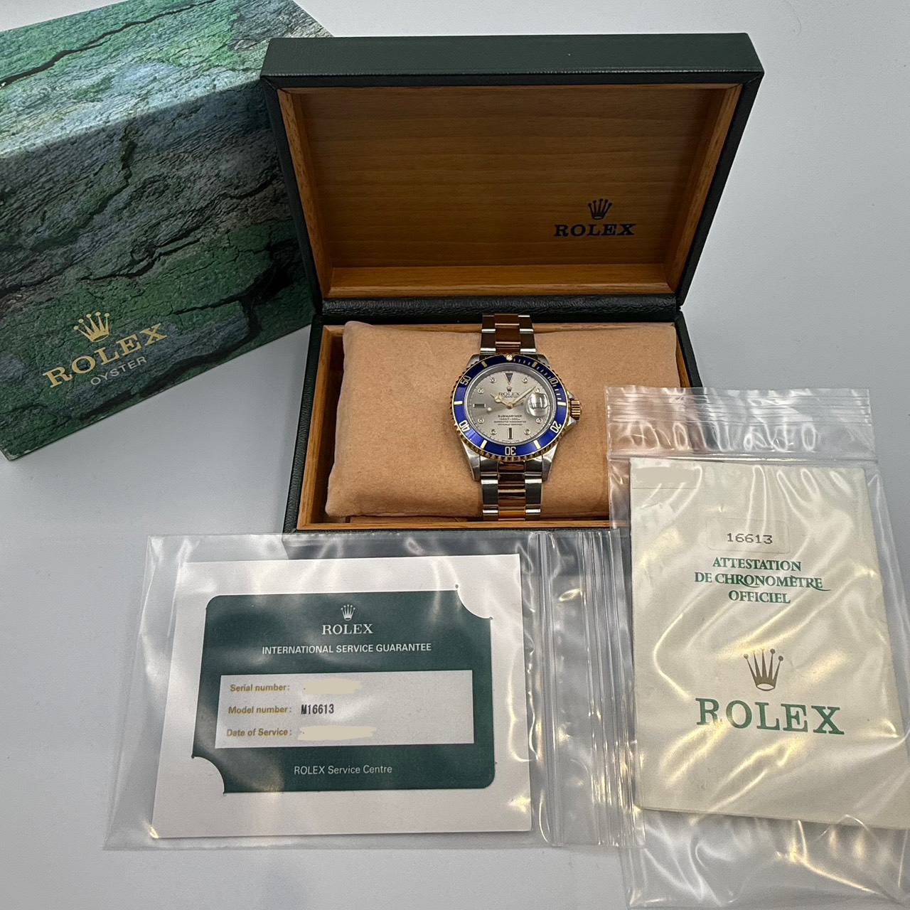 ROLEX(����å���) ���֥ޥ꡼�ʥǥ��� 16613SG ����С� T��(1996) ����� ���ض�Ź ST-692