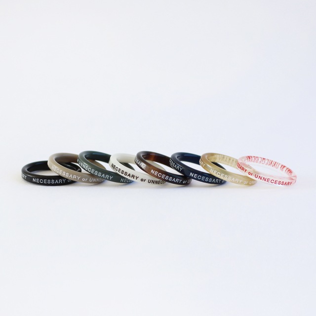 necessary or unnecessary ネセサリー オア アンネセサリー｜BUTTON RING 2　 アンバー