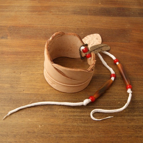 Limited Carved Leather Feather Bangle Natural