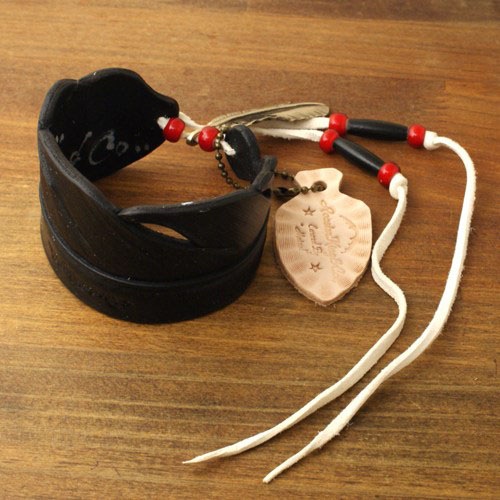 Carved Leather Feather Bangle