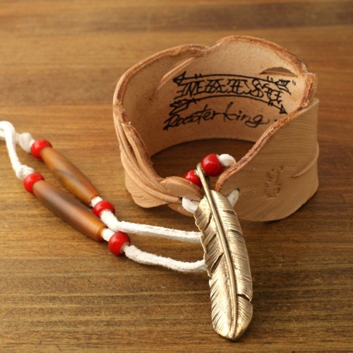 Limited Carved Leather Feather Bangle Natural