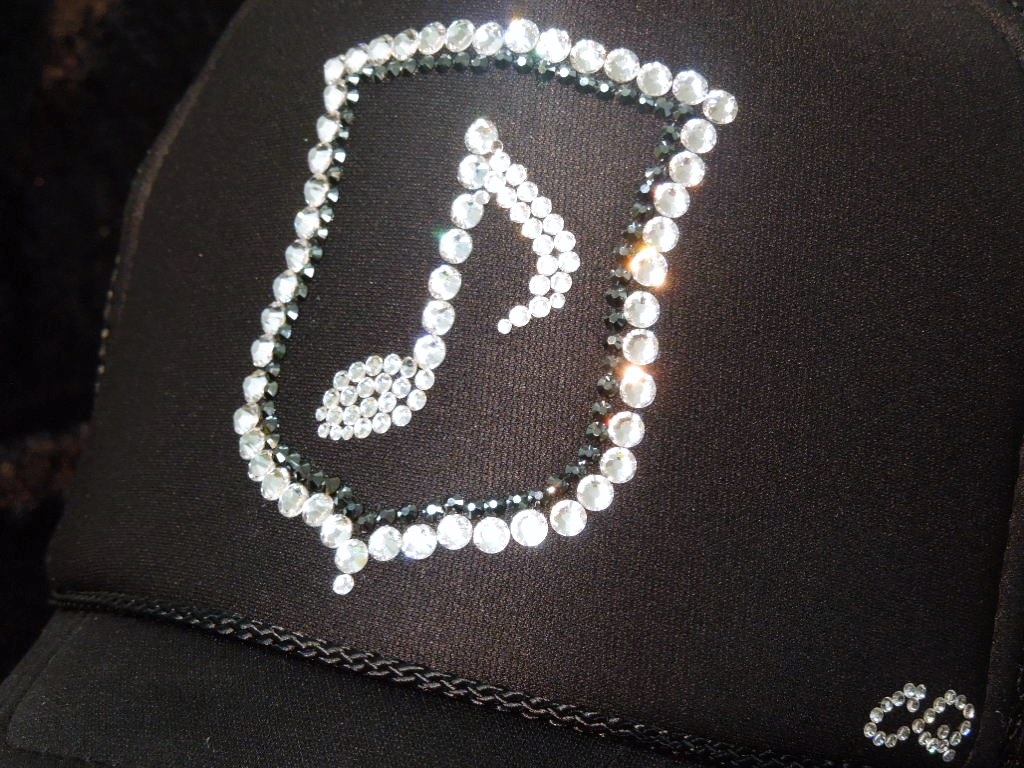 Melody emblem Swarovski black cap