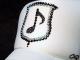 Melody emblem Swarovski white cap