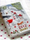 〈〈2012年 手帳〉〉　　【MICAO　ダイアリー/絵本の國・ワインパーティ】　刺繍カバースケジュール帳＜A6型 マンスリー＞|SOLD OUT