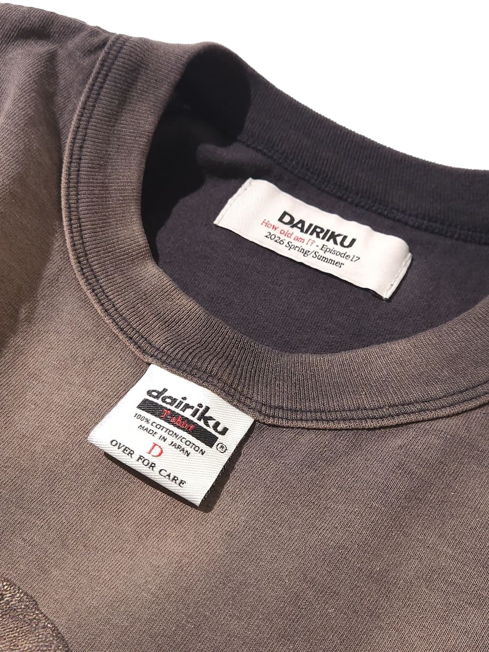 DAIRIKU(ダイリク) “BUTTON EYE DOLL“ Sunburn H-S Tag Tee - COLDBECK
