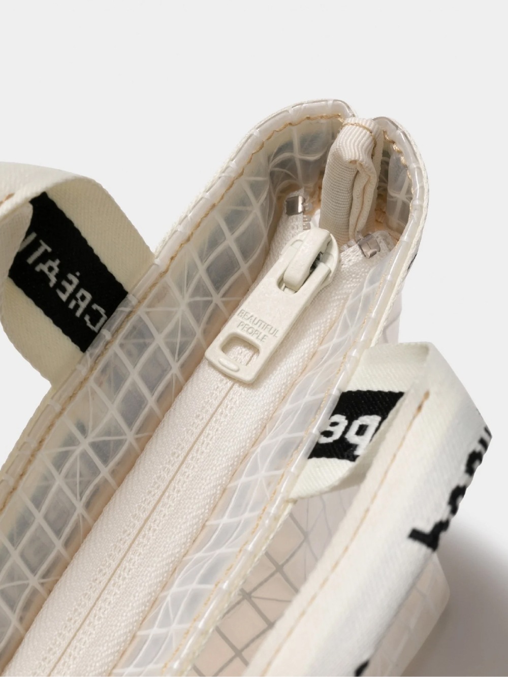 beautiful people(ビューティフルピープル) plaid vinyl logo poach