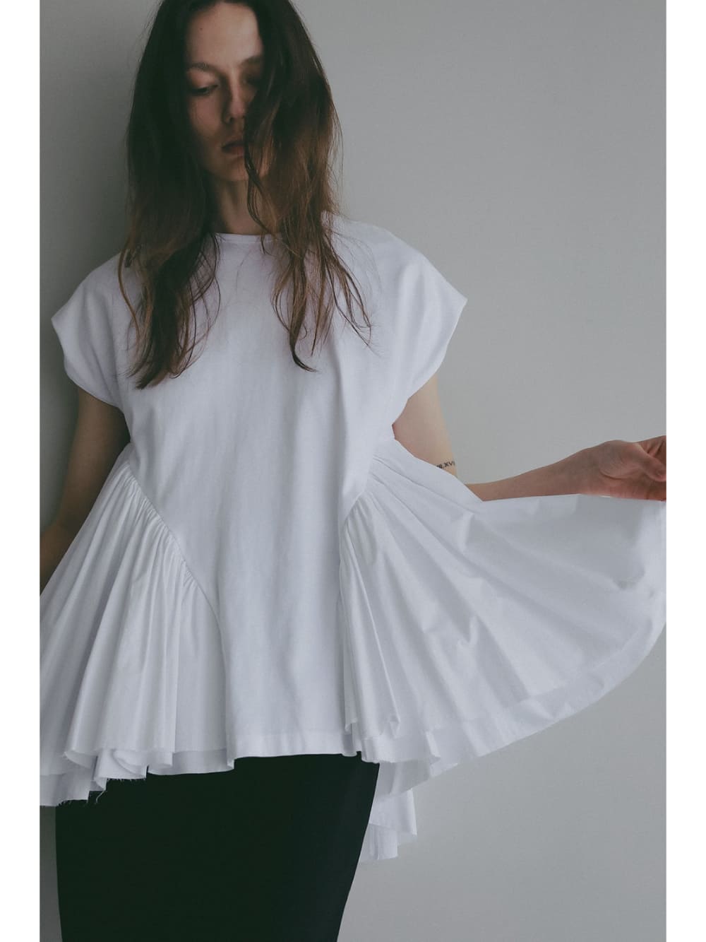 MANOF(マノフ) DOCKING PEPLUM CUT TOPS