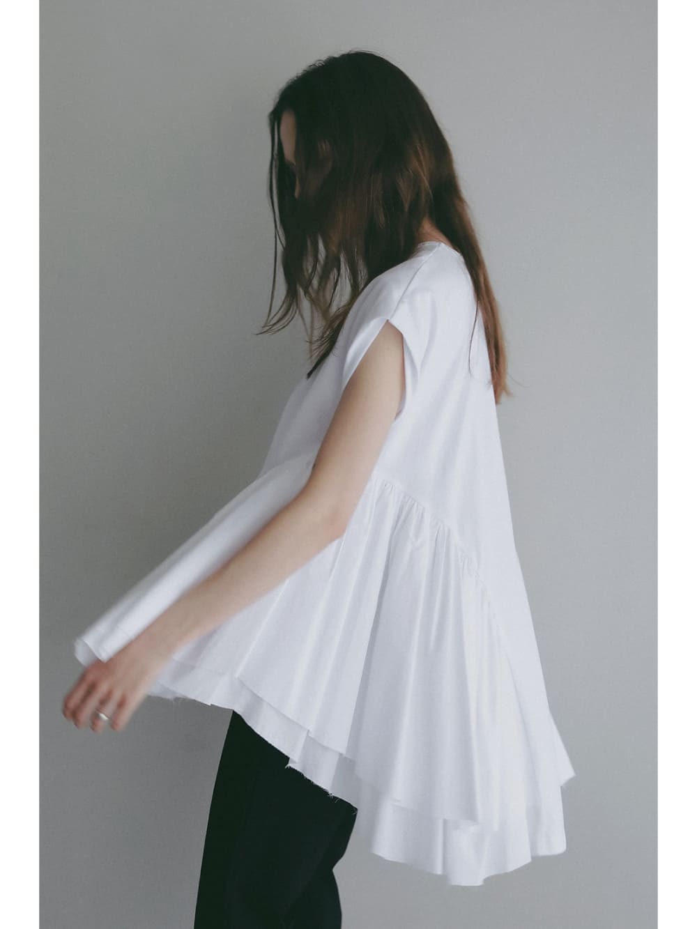 MANOF(マノフ) DOCKING PEPLUM CUT TOPS