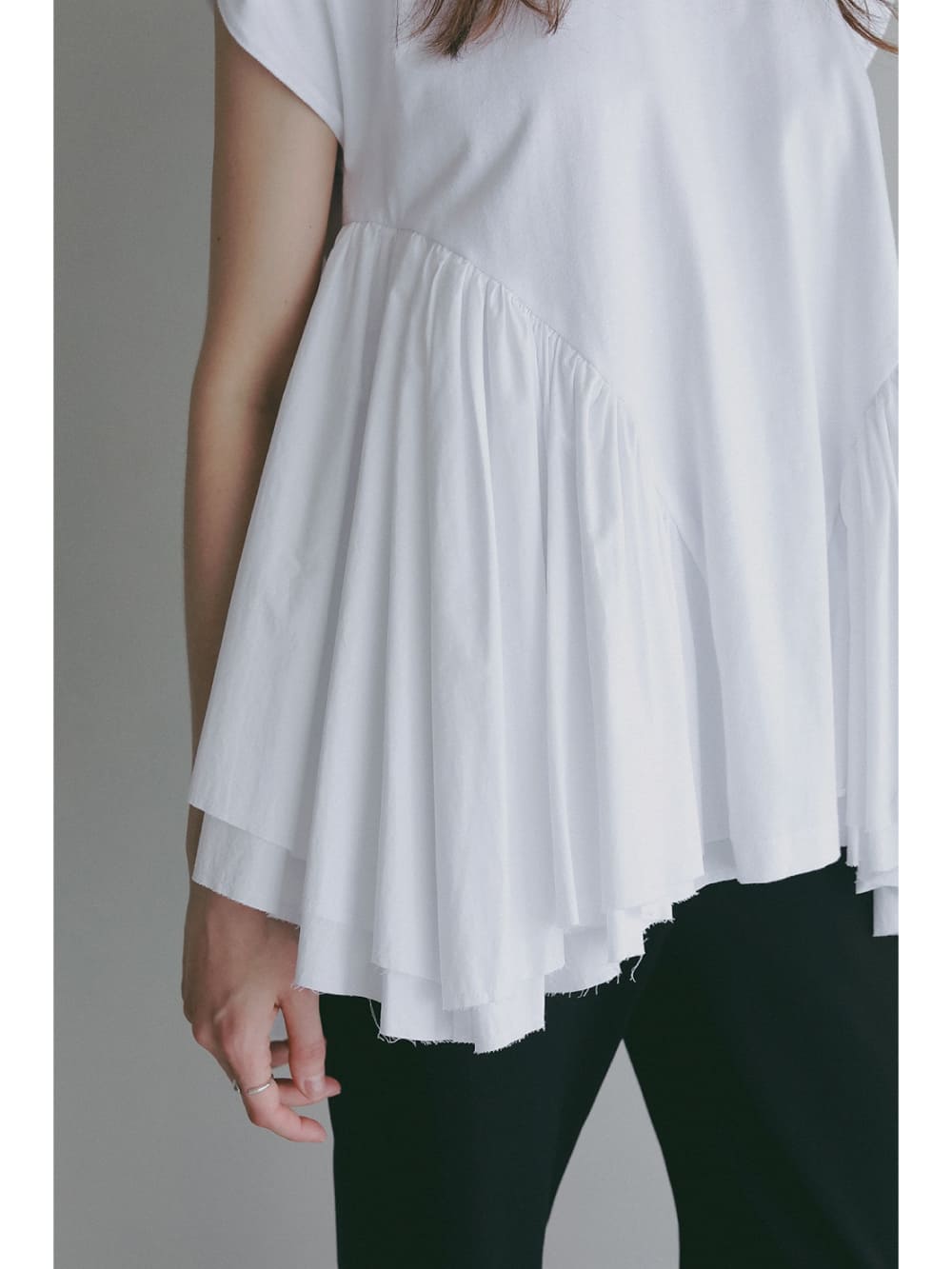 MANOF(マノフ) DOCKING PEPLUM CUT TOPS