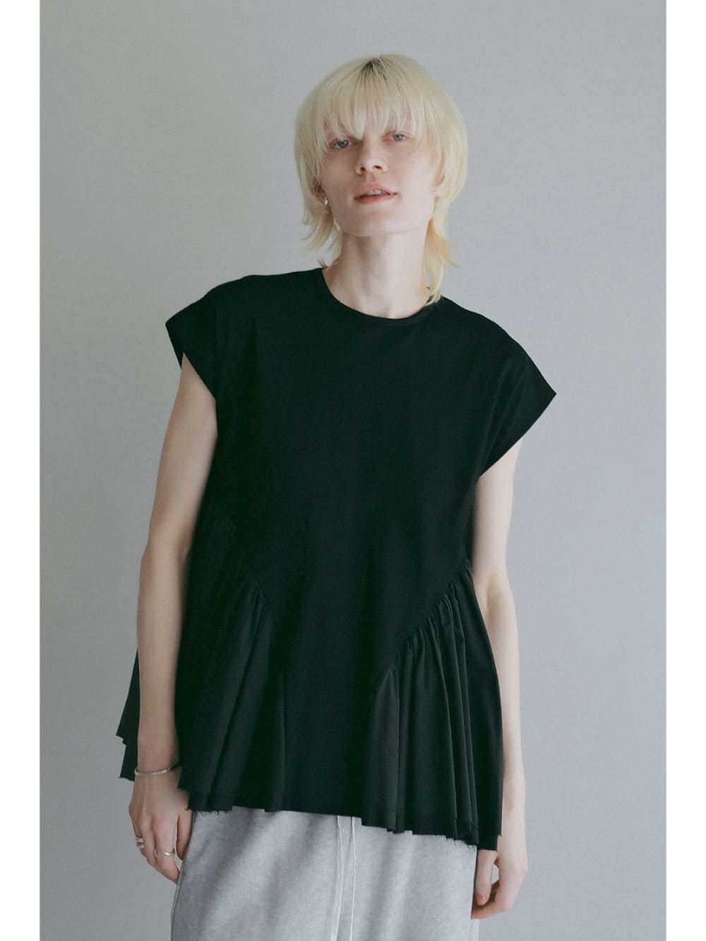 MANOF(マノフ) DOCKING PEPLUM CUT TOPS