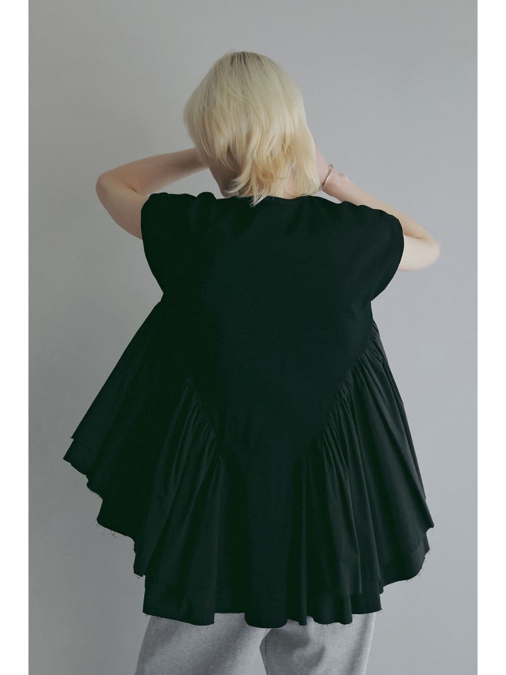 MANOF(マノフ) DOCKING PEPLUM CUT TOPS