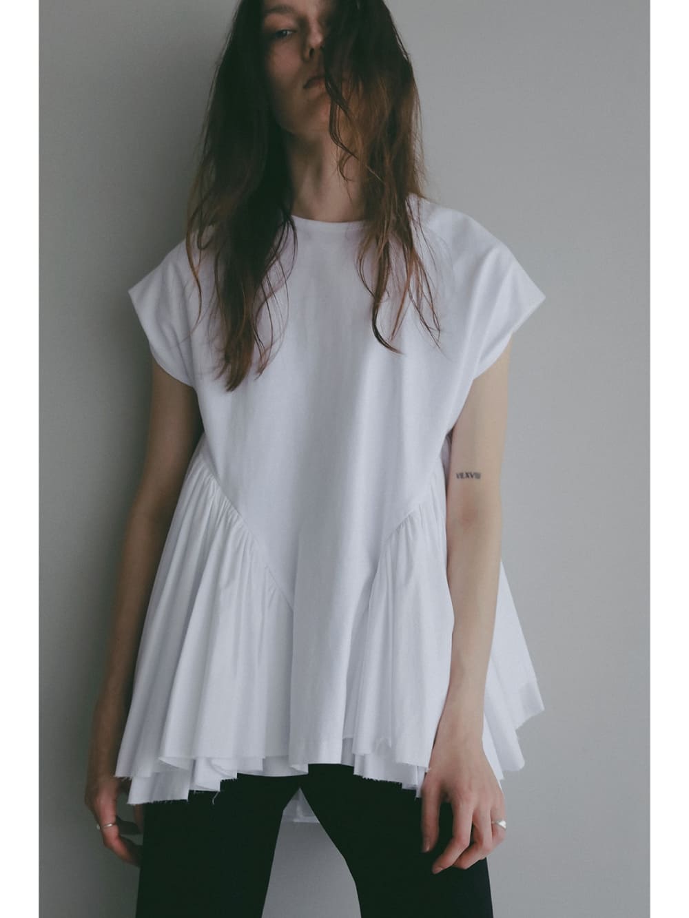 MANOF(マノフ) DOCKING PEPLUM CUT TOPS