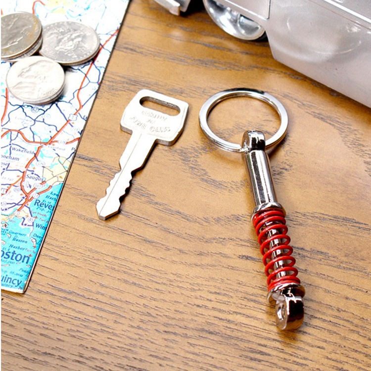 【メール便発送】キーホルダー カーパーツキーリング 「サスペンション」 キーホルダー 車の部品 アメリカン雑貨カーパーツ型のクールなキーリング。