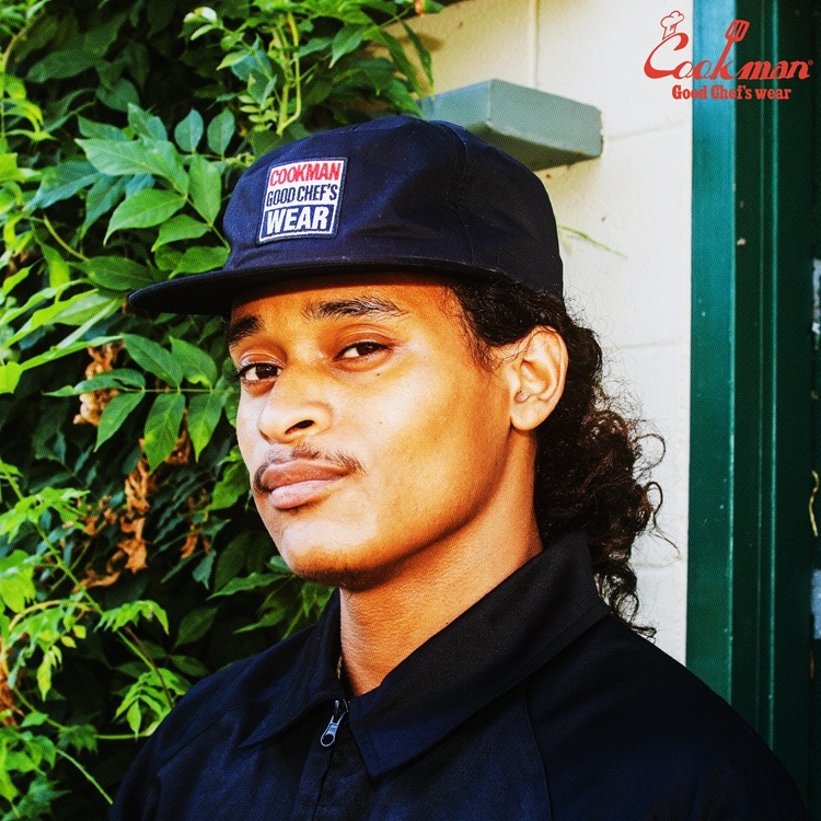�ǥ�Х꡼���㥱�å� Delivery Jacket Vision Logo Black