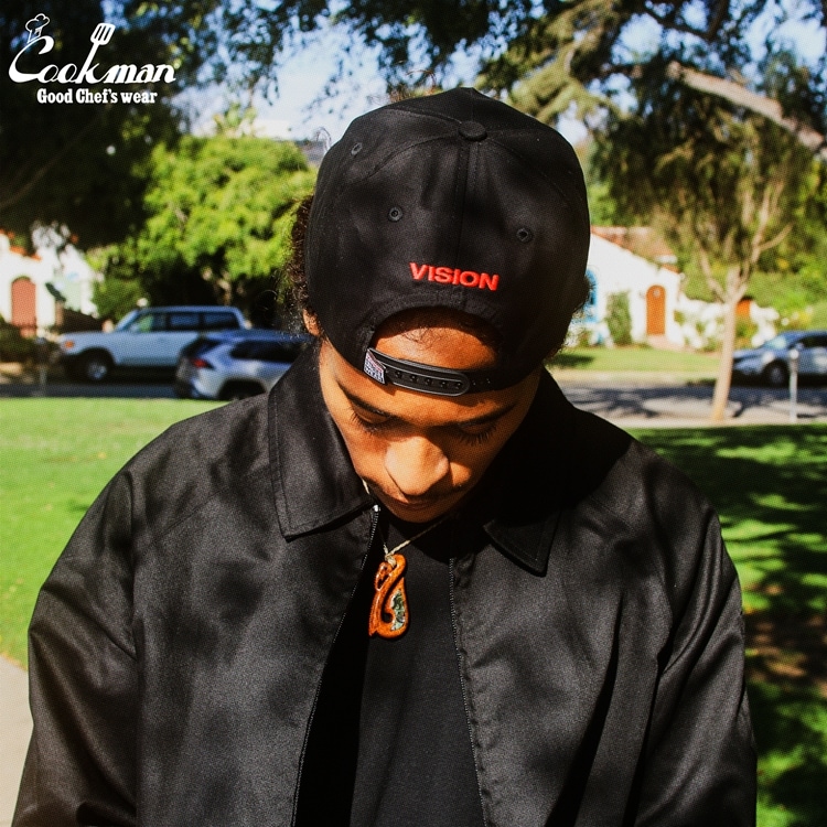 �ǥ�Х꡼���㥱�å� Delivery Jacket Vision Logo Black
