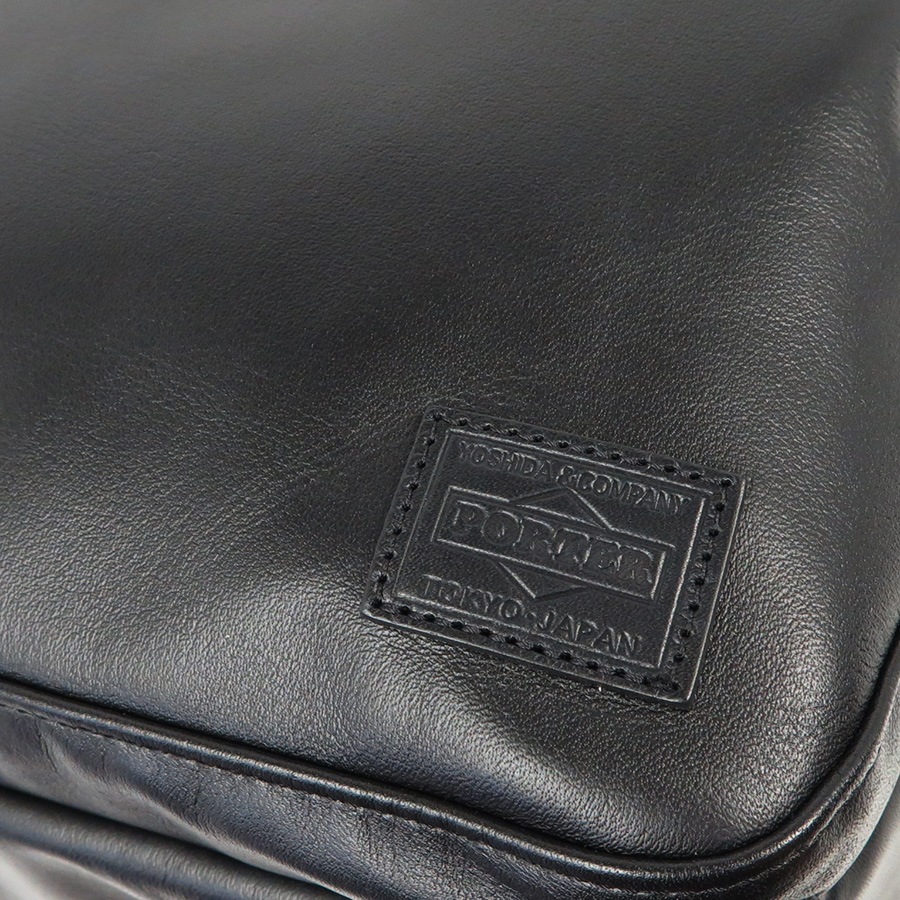 ユリ　POMTATA ブラック ケース ユリ・コジマ オーストリッチ型押し バッグ 合皮 スマホが