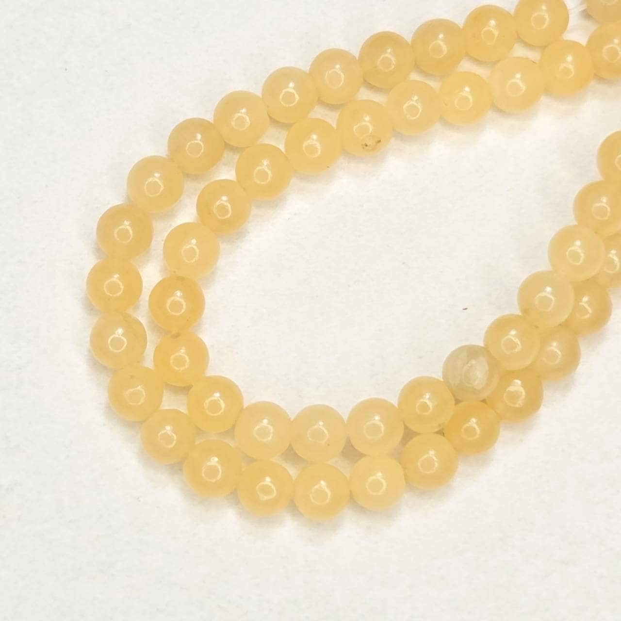 天然石連ビーズ‐アラゴンナイト4㎜