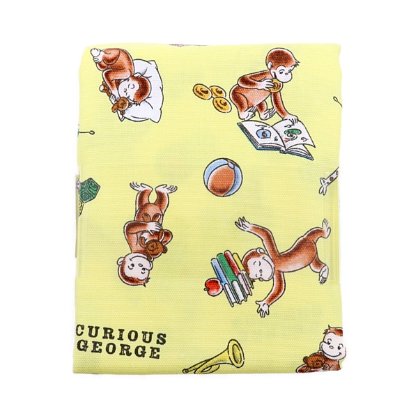 生地 おさるのジョージ オックス ブック柄 【50cmカットクロス