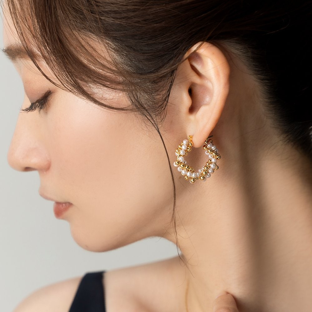 【CaitlynMinimalist】ツイストフープピアス★日本未入荷! ゆうパケット】 ピアス チタンポスト 低アレルギー レディース