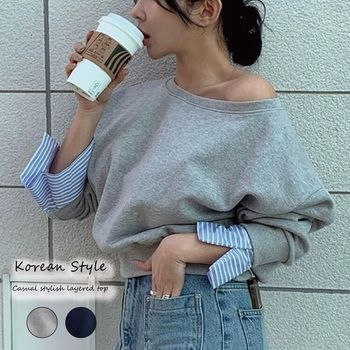 ボーダー袖でカジュアルだけどきれいめに。上品さと抜け感を両立したレイヤード風スウェットトップス