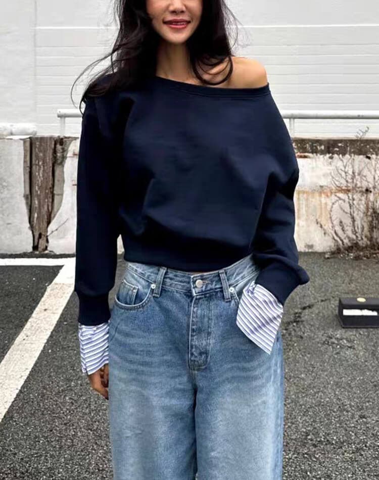 ボーダー袖でカジュアルだけどきれいめに。上品さと抜け感を両立したレイヤード風スウェットトップス