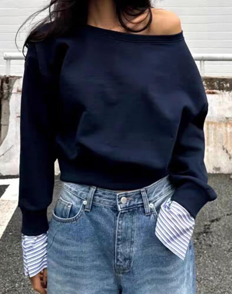 ボーダー袖でカジュアルだけどきれいめに。上品さと抜け感を両立したレイヤード風スウェットトップス