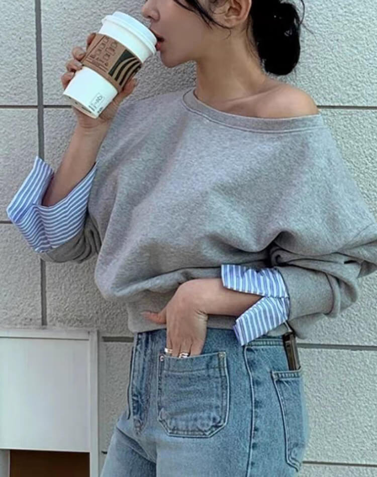 ボーダー袖でカジュアルだけどきれいめに。上品さと抜け感を両立したレイヤード風スウェットトップス