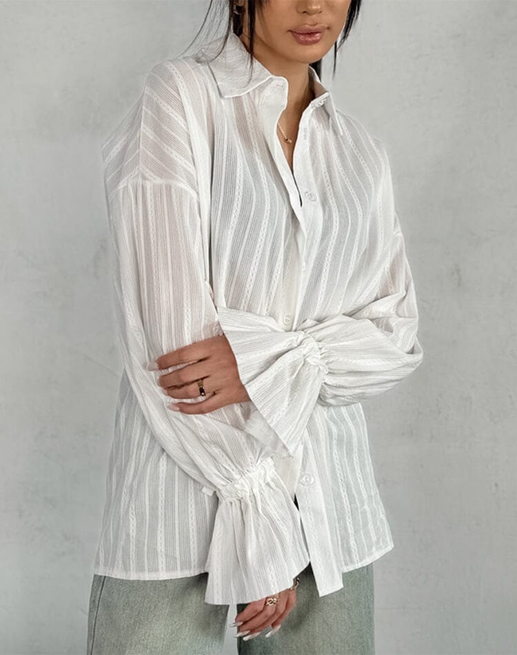 華やかで上品 ベルスリーブが映える綿ジャガードブラウス