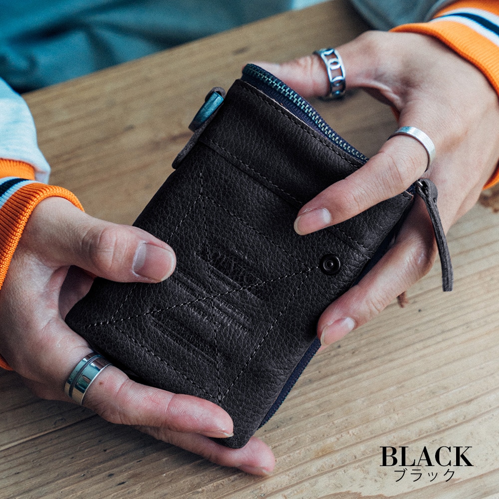 【美品】DIESEL 本革 2way マルチ〈定価137,500円〉 1DR BI-FOLD ZIP II Small leather wallet with logo plaque｜ホワイト