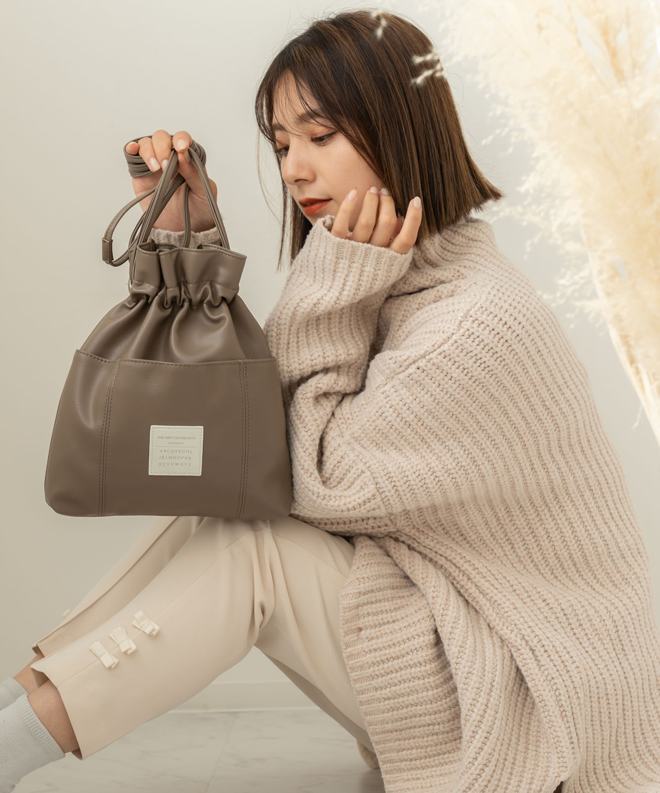 Rename カジュアルデザイン オリジナルタグ 巾着ショルダーバッグ