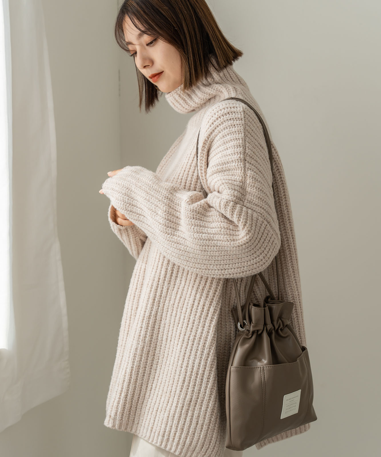 Rename カジュアルデザイン オリジナルタグ 巾着ショルダーバッグ