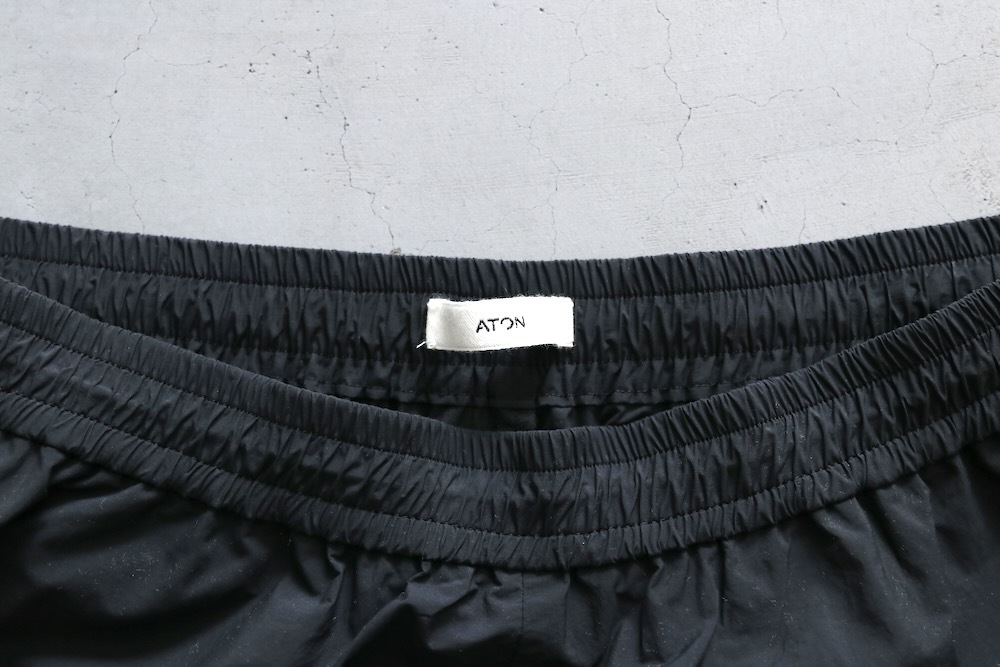 ATON (ȥ) "TRAVEL NYLON WIDE EASY SHORTS"
