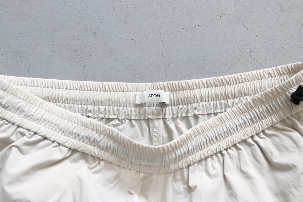 ATON (ȥ) "TRAVEL NYLON WIDE EASY SHORTS"