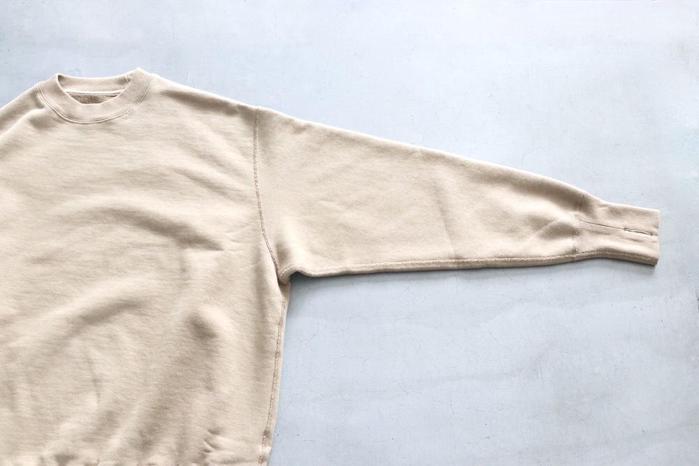 Unlikely (饤꡼) "Unlikely Split Raglan Sleeve Crew"