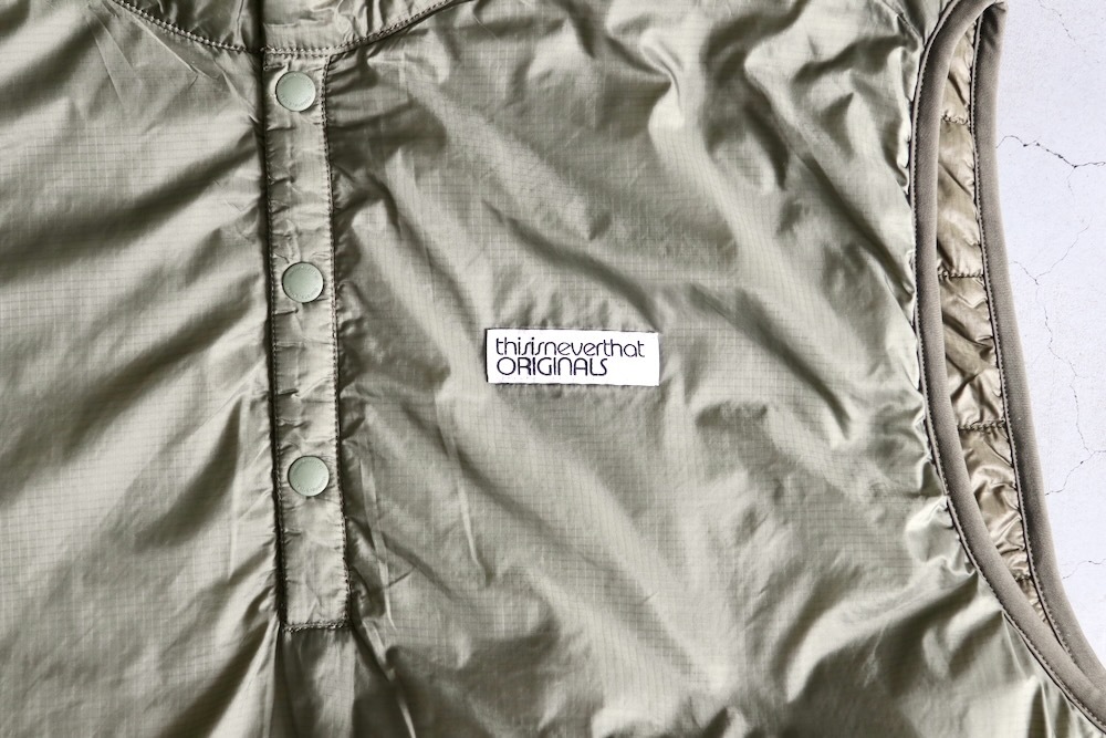 ��20%Off coupon�оݡ�thisisneverthat (�ǥ��� ���� �ͥС����å�) "Insulated Reversible Vest"