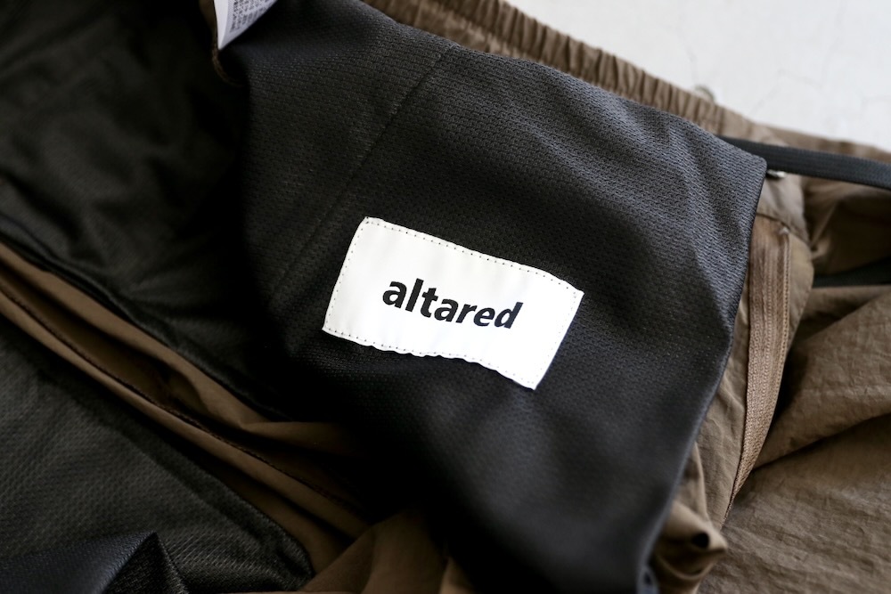 altared(륿) "Nylon Washer Track Pants"