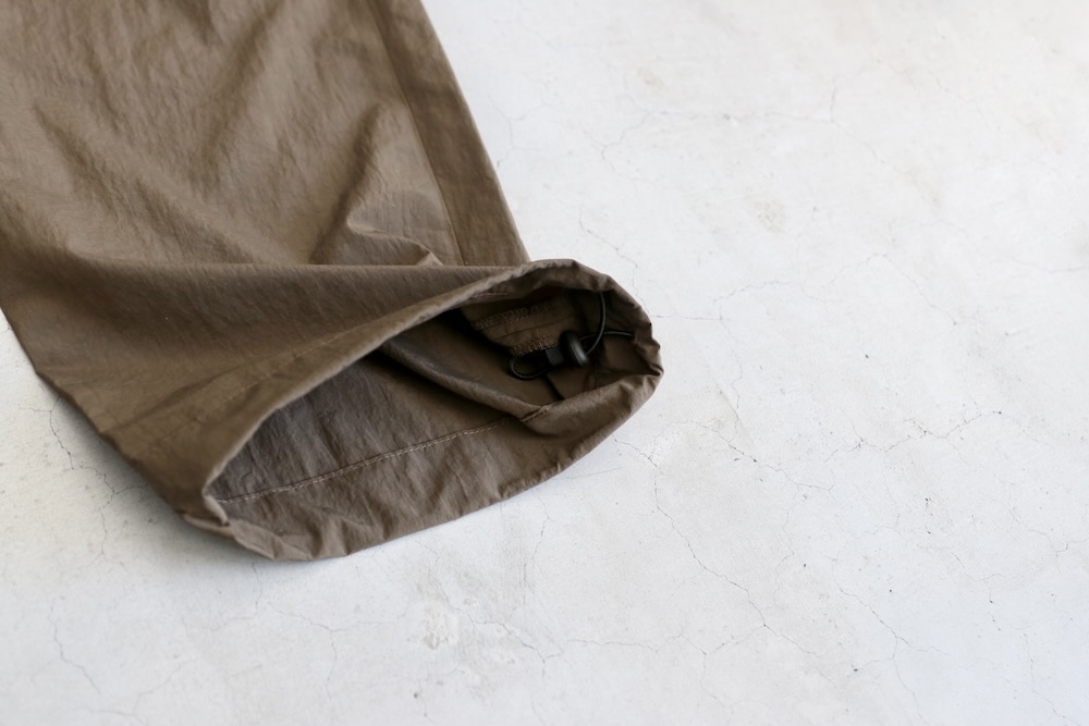 altared(륿) "Nylon Washer Track Pants"